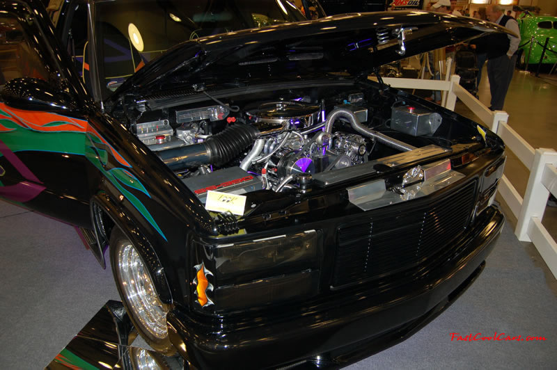 The 2009 World of Wheels Show in Chattanooga, Tennessee. On Jan. 9th,10, & 11th, Pictures by Ron Landry. Custom painted low rider pickup with lots of Money under the hood too.