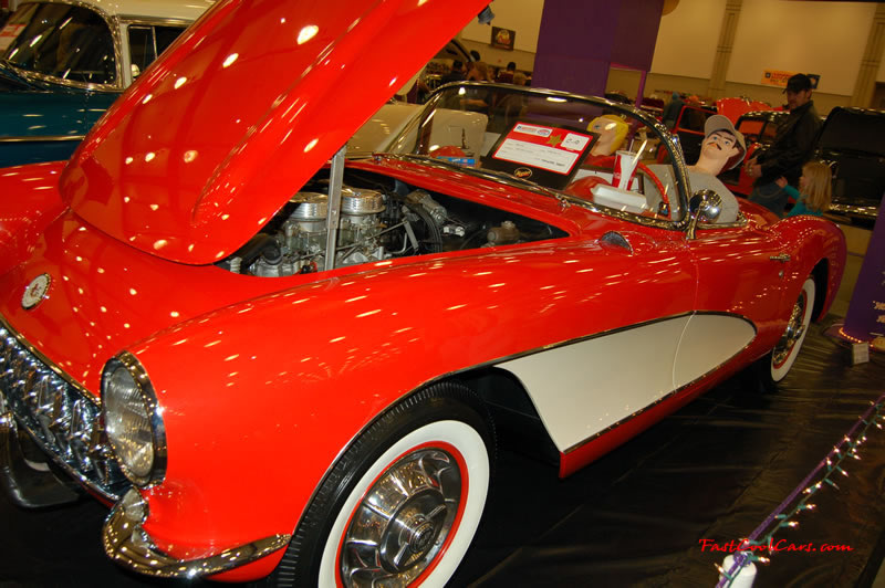 The 2009 World of Wheels Show in Chattanooga, Tennessee. On Jan. 9th,10, & 11th, Pictures by Ron Landry. Dual quad carbs on this sweet Chevy Corvette Convertible.