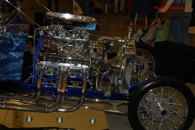 The 2009 World of Wheels Show in Chattanooga, Tennessee. On Jan. 9th,10, & 11th, Pictures by Ron Landry. Dual quad small block chevy engine all customized with polished aluminum and chrome.