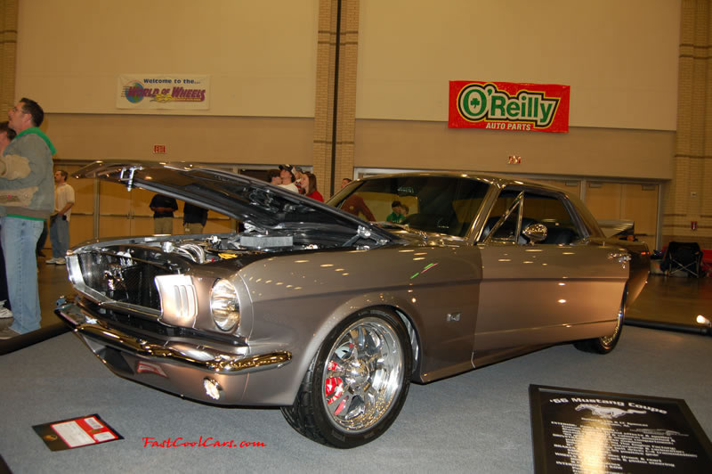 The 2009 World of Wheels Show in Chattanooga, Tennessee. On Jan. 9th,10, & 11th, Pictures by Ron Landry. Older Ford Mustang GT with custom wheels that are polished aluminum.