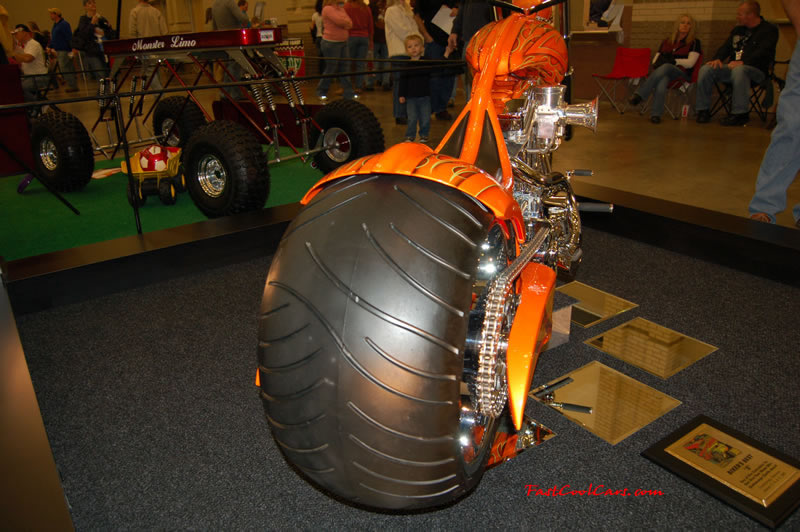 The 2009 World of Wheels Show in Chattanooga, Tennessee. On Jan. 9th,10, & 11th, Pictures by Ron Landry. Oh my Gosh look how wide that rear tire on this custom chopper is. That is Huge. And what a great view of the customizing that went on here.
