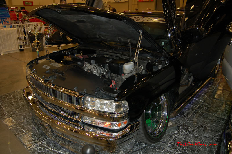 The 2009 World of Wheels Show in Chattanooga, Tennessee. On Jan. 9th,10, & 11th, Pictures by Ron Landry. This thing is slammed. This truck has lambo doors and side pipes.