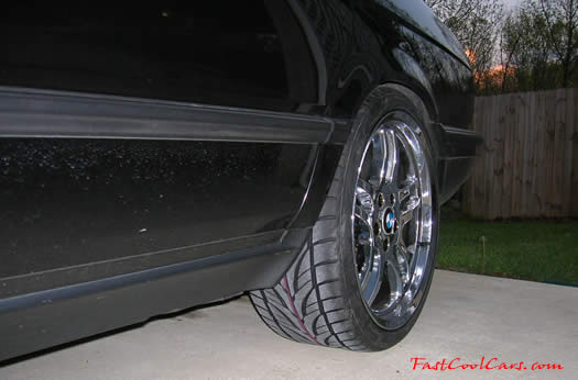 1994 BMW 740iL with 19" chrome M-Parallel wheels, 275/30/19 on the rear, and 245/35/19 on the fronts.