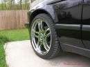 1994 BMW 740iL with chrome 19 inch M-Parallel wheels, 245/35/19 ZR front tires.