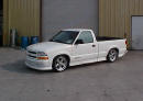 1999 Chevrolet Extreme pick-up with 18' chrome Ultras, and wide tires.