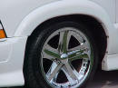 1999 Chevrolet Extreme pick-up with 18' chrome Ultras, and wide tires.