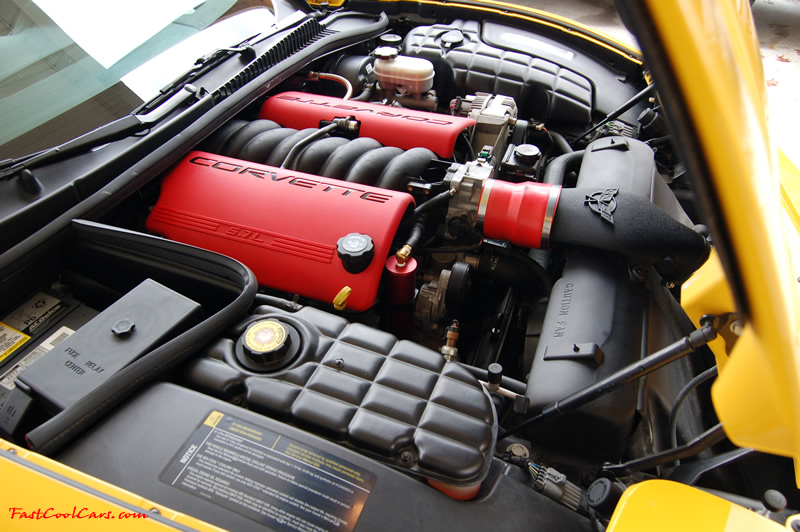 2002 Millennium Yellow Z06 Corvette - 405 HP Stock, at new home in Cleveland, Tennessee, with new red silicone striaght air inlet duct, and red anodized aluminum oil catch can.