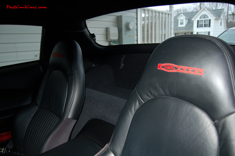 2002 Millennium Yellow Z06 Corvette - 405 HP Stock, at new home in Cleveland, Tennessee, leather interior with red embroidered seats with the Z06 logo. Just like new interior.