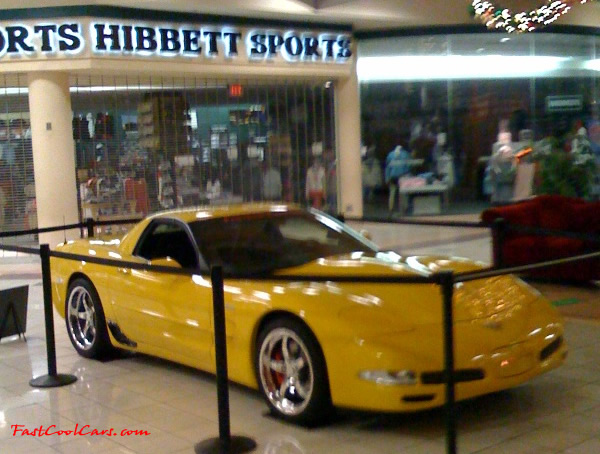 2002 Millennium Yellow supercharged & methanol injected Z06 Corvette, with many modifications, over 50 grand invested in the past 2+ years, for sale $38,000 what a deal. 555 HP | 565TQ - Polished blower. IPhone camera picture, low light, after mall was closed.
