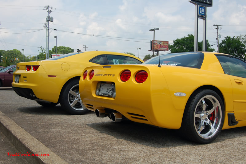 2010 Chevrolet Camaro 2LT and 2002 Supercharged Z06 Corvette, both in yellow.