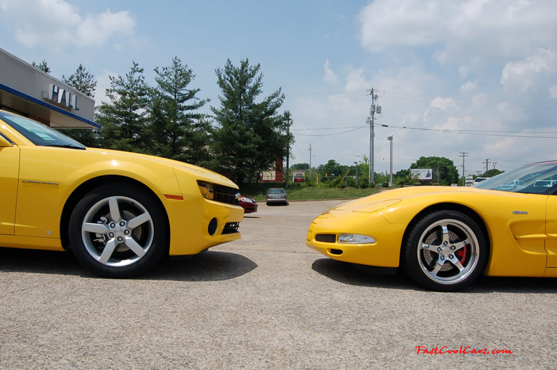 2010 Chevrolet Camaro 2LT and 2002 Supercharged Z06 Corvette, both in yellow.