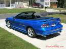 1998 Mustang Cobra Convertible - 1 of 223 - Electric blue, with top down, and stainless Cobra letters