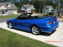 1998 Mustang Cobra Convertible - 1 of 223 - Electric blue, with top down, and new top cover.