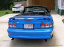 1998 Mustang Cobra Convertible - 1 of 223 - Electric blue, with top down.