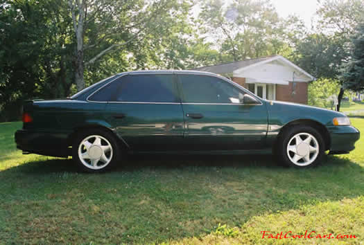 1993 Ford Taurus SHO - Nice 16' "Cheese Slicer" wheels, with wide performance tires - fastcoolcars.com