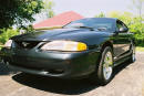 1998 Ford Mustang GT - left front angle view - Fast Cool Cars