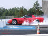 C5 Chevrolet Z06 Corvette 2001 - 2004, 385 to 405 horsepower, Aluminum block and heads LS6, all with 6 speeds.  America's sport car in Red, at the track, doing a huge burnout.