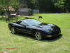 C5 Chevrolet Z06 Corvette 2001 - 2004, 385 to 405 horsepower, Aluminum block and heads LS6, all with 6 speeds.  America's sport car in Black with chrome Z06 wheels.