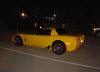 C5 Chevrolet Z06 Corvette 2001 - 2004, 385 to 405 horsepower, Aluminum block and heads LS6, all with 6 speeds.  America's sport car in Millennium Yellow. Night time view.