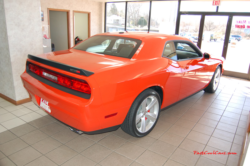 2009 Dodge Challenger SRT8 - 6.1 Hemi with 425HP, and this one is a 6 speed what an awesome view, right rear angel, such a sweet looking modern day muscle car.