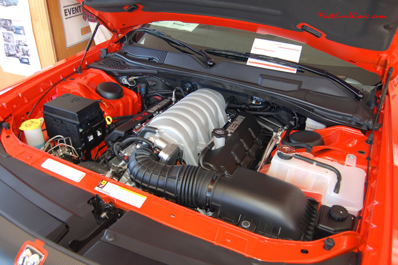 2009 Dodge Challenger SRT8 - 6.1 Hemi with 425HP, and this one is a 6 speed great looking engine.