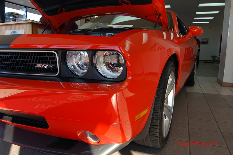 2009 Dodge Challenger SRT8 - 6.1 Hemi with 425HP, and this one is a 6 speed the side body lines are sweet.