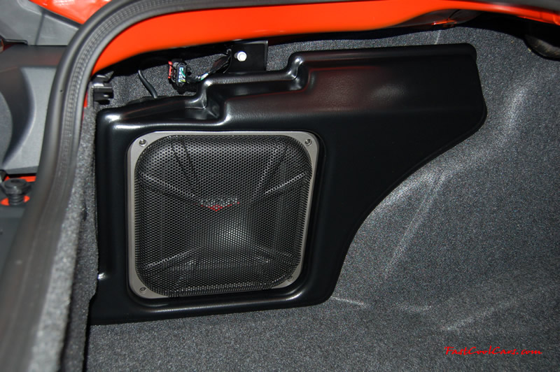 2009 Dodge Challenger SRT8 - 6.1 Hemi with 425HP, and this one is a 6 speed Kicker sub woofer in the trunk, so you know this ride will BUMP. cool whip.