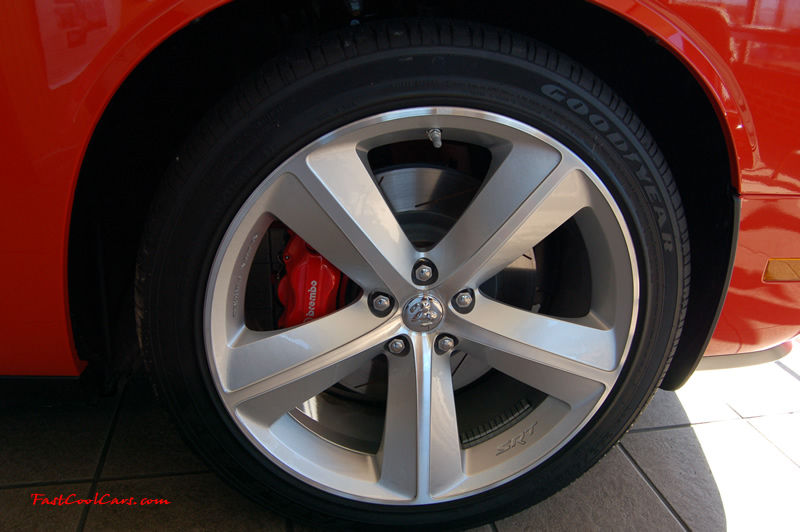 2009 Dodge Challenger SRT8 - 6.1 Hemi with 425HP, and this one is a 6 speed, love the Brembo big brake kits on the SRT8.