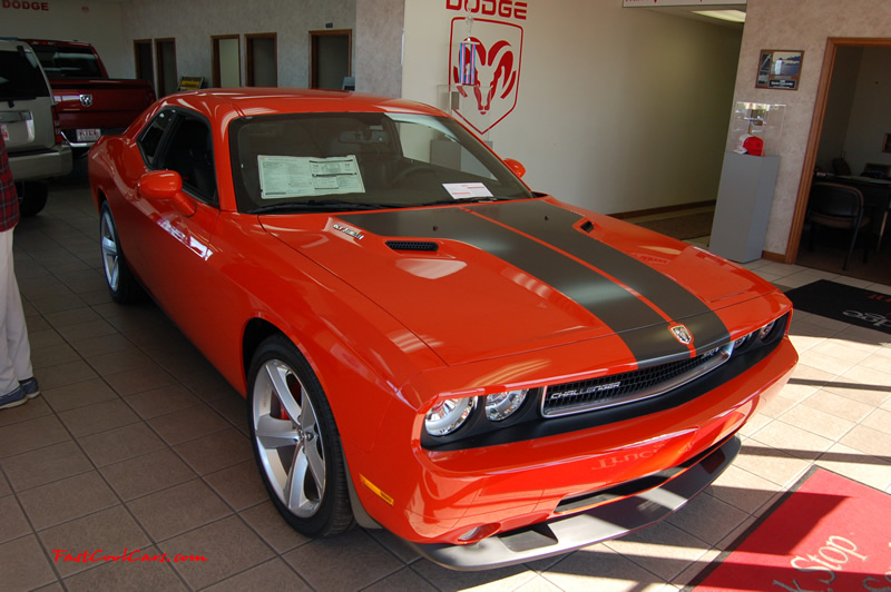2009 Dodge Challenger SRT8 - 6.1 Hemi with 425HP, and this one is a 6 speed, love the lower front chin spoiler.