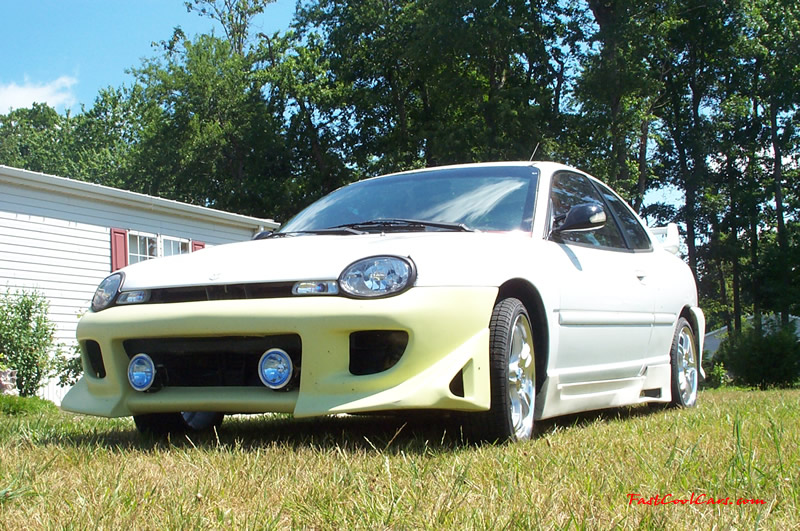 1998 Dodge Neon - White, and has way to many mods to list.