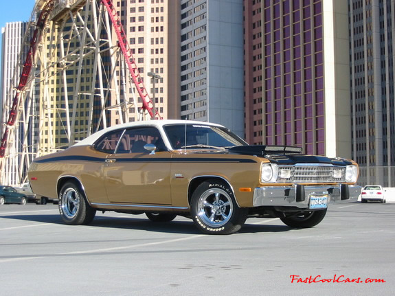 1973 Plymouth Duster 340, custom chrome mag wheels.