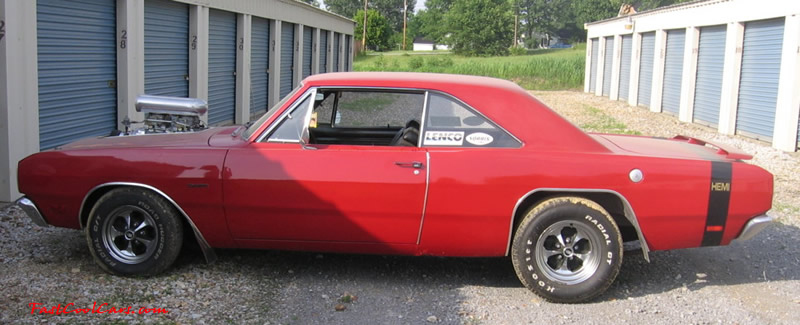 1969 Dodge Dart Hemi. Blown V8 - Red, black interior, lightning rod shifters, dual quad carbs.