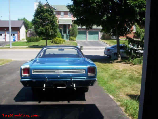 1969 Plymouth Satellite Mod top car. As you can see, it is a beauty. It sits in 4 chrome Magnum 500 wheels mounted on BF Goodrich TA's.