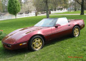 1988 Corvette Convertible, Automatic, Maroon w/ peanut butter top and leather seats; 350 cubic inch Engine