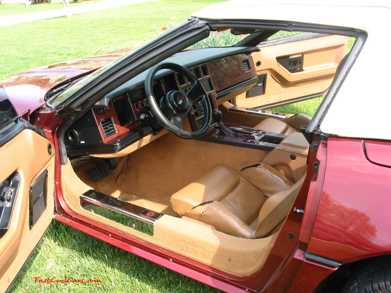 1988 Corvette Convertible, Automatic, Maroon w/ peanut butter top and leather seats; 350 cubic inch Engine