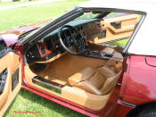 1988 Corvette Convertible, Automatic, Maroon w/ peanut butter top and leather seats; 350 cubic inch Engine