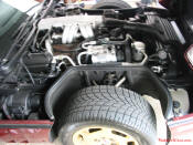 1988 Corvette Convertible, Automatic, Maroon w/ peanut butter top and leather seats; 350 cubic inch Engine