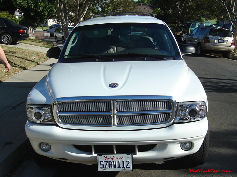 2002 Dodge Durango SLT 4.7 White w/white powder coated rims Third row seat, Roof Rack, tinted windows, 22" velocity white rims, 5" chrome lip, lexani tires, Brand new Gabriel Shocks all around