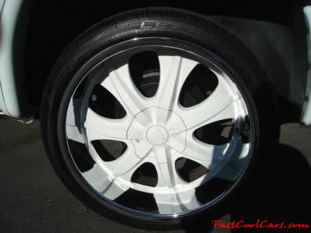 2002 Dodge Durango SLT 4.7 White w/white powder coated rims Third row seat, Roof Rack, tinted windows, 22" velocity white rims, 5" chrome lip, lexani tires, Brand new Gabriel Shocks all around