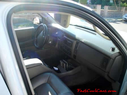 2002 Dodge Durango SLT 4.7 White w/white powder coated rims Third row seat, Roof Rack, tinted windows, 22" velocity white rims, 5" chrome lip, lexani tires, Brand new Gabriel Shocks all around