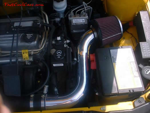 2002 Chevrolet Cavalier nice Yellow paint, chrome wheels, dropped chrome intake tube with K&N cone filter