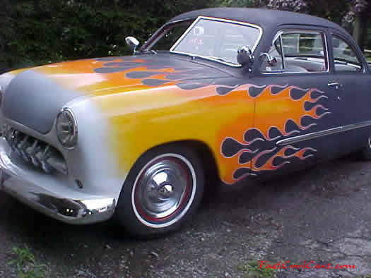 1950 Ford club coupe - better known as a shoebox. with custom flame paint job.