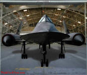 Stealth looking jet in hanger, on garage door decal.