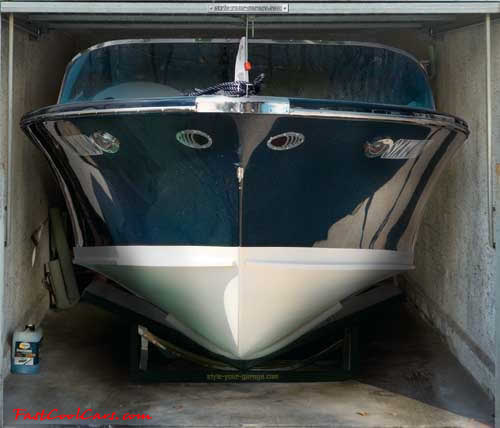 Huge nice boat with cubby compartment, on garage door decal.
