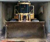 Huge bull dozer, on garage door decal.