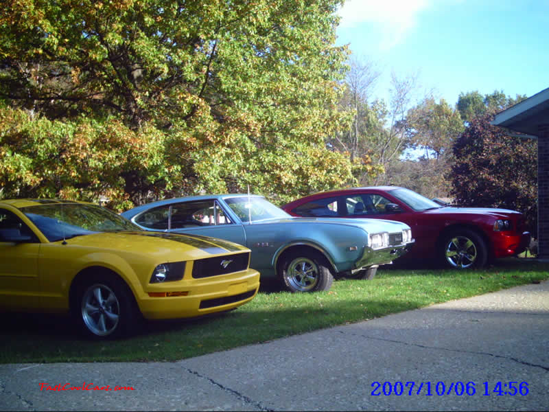 1968 Oldsmobile 442 455 big block engine and 4 speed transmission pictured with there Mustang and Charger, lol Ford, General Motors, and Chrysler