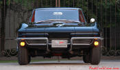 1964 Chevrolet Corvette Coupe - In the 1964 Corvette not much changed. However the split rear window of the 1963 model was now Corvette history. The '64 was optioned with a rare color combination and a fuel injected engine.