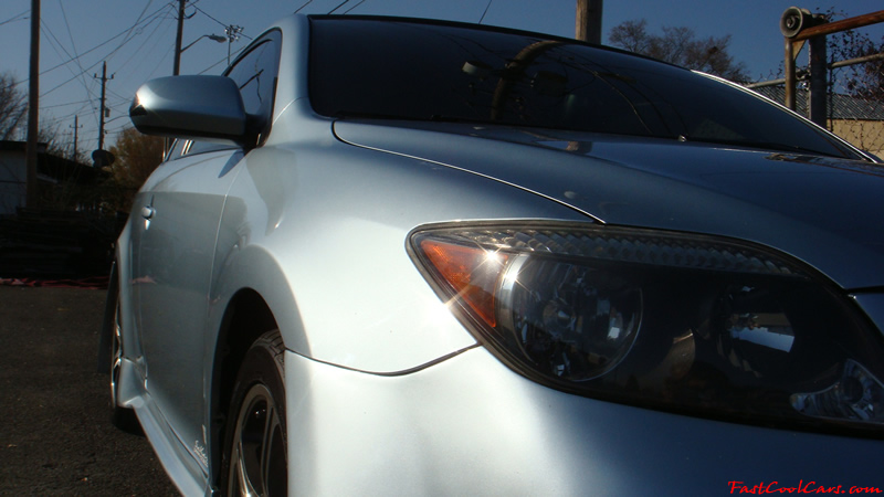 2005 Scion tC Azure Pearl with a TRD muffler, custom interior, blue led lights inside cabin area, changing color LED's, 17" ICW racing wheels