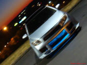 2005 Scion tC Azure Pearl with a TRD muffler, custom interior, blue led lights inside cabin area, changing color LED's, 17" ICW racing wheels