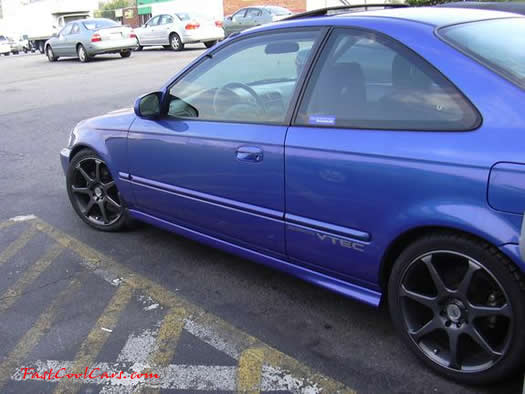 im really thinkin its a teg with 9900 civic Si wheels or somthing close